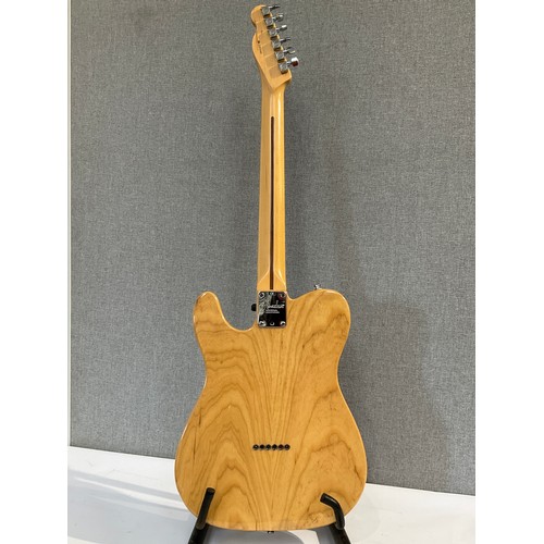 5106 - A Fender American Series Telecaster in natural ash, serial number Z1032582, maple neck, Fender hard ... 