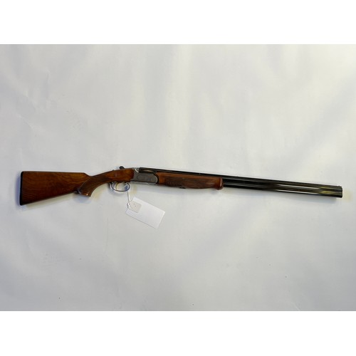 9269 - A Sabbatti 20 gauge over / under shotgun, serial no. 77249, with green sleeve *BUYER MUST PRESENT VA... 