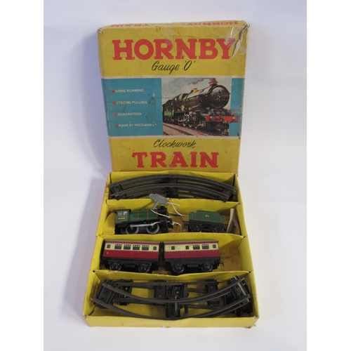 9033 - A boxed Horny '0' gauge clockwork train set with track and original key