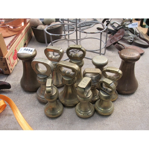 9056 - A collection of brass bell weights; 1lb, 2lb and 4lb examples        (R) £90