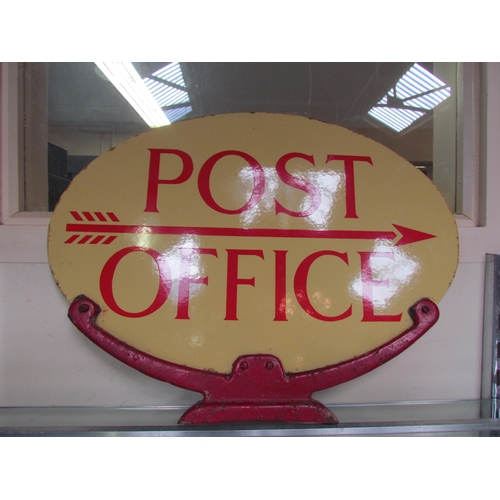 9170 - An enamel Post Office sign in original cast iron mount, 46cms long, 29cms deep