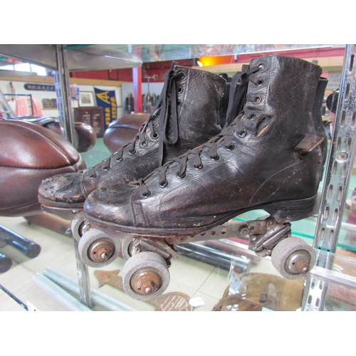 9175 - A pair of vintage leather roller skates     (R) £10