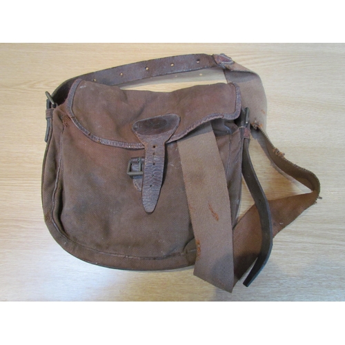 9201 - A leather and canvas fishing bag