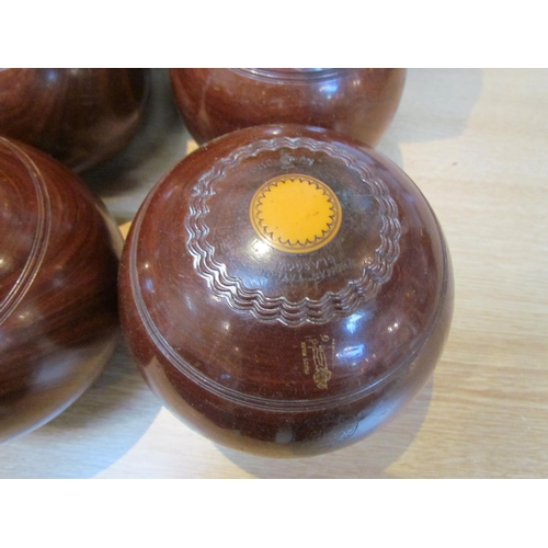 9204 - Four cased Thomas Taylor, Glasgow wooden lawn bowls