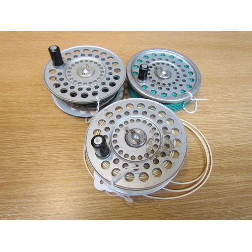 9229 - Three alloy fishing spools         (E) £10-15