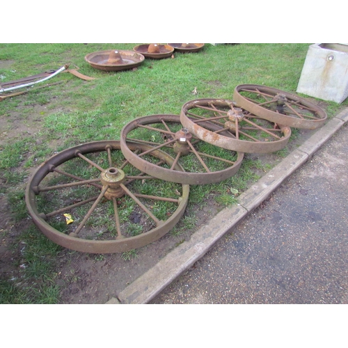 9304 - A set of four iron shepherd hut wheels, 38.5