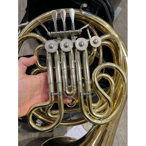 5124 - A Yamaha French horn, brass, model YHR667, some indentations and wear, with fitted Yamaha hard case