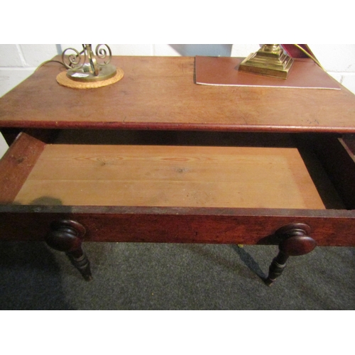 1004 - A Victorian single drawer side table with turned legs, 75cm high x 84cm wide x 46cm deep