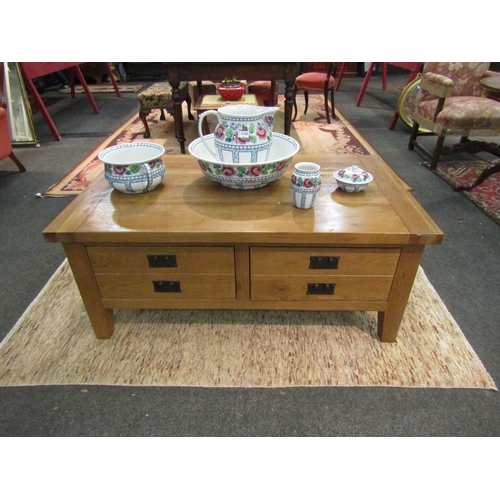 1104 - A modern light oak coffee table with frieze drawers, square tapering legs, 50cm high x 120cm long x ... 