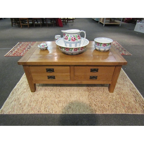 1104 - A modern light oak coffee table with frieze drawers, square tapering legs, 50cm high x 120cm long x ... 