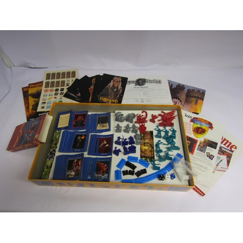 7011 - Two TSR Dragon Strike role playing fantasy board games with part contents (2)