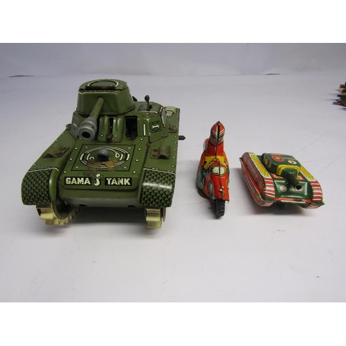 7086 - A West German tinplate clockwork Gama T65 tank together with a smaller tinplate tank, British made t... 