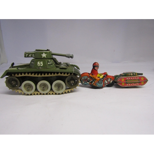 7086 - A West German tinplate clockwork Gama T65 tank together with a smaller tinplate tank, British made t... 