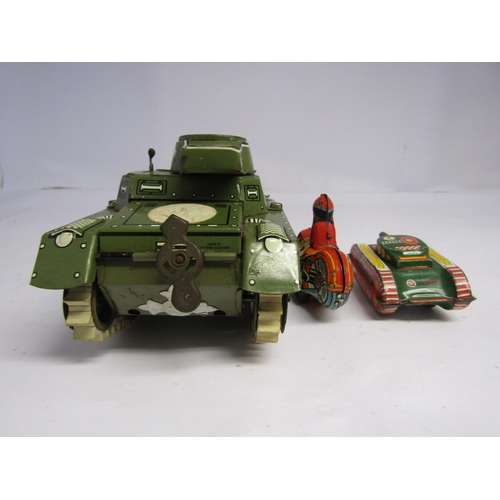 7086 - A West German tinplate clockwork Gama T65 tank together with a smaller tinplate tank, British made t... 