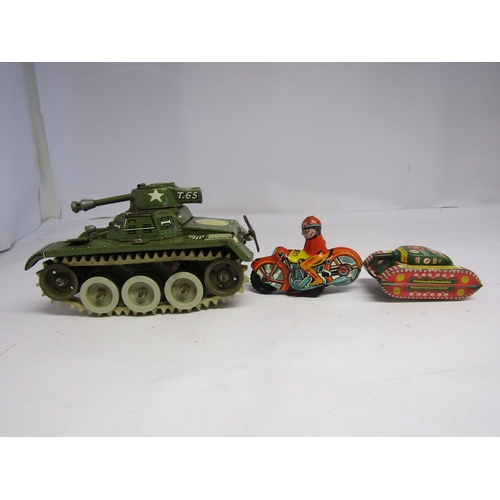 7086 - A West German tinplate clockwork Gama T65 tank together with a smaller tinplate tank, British made t... 