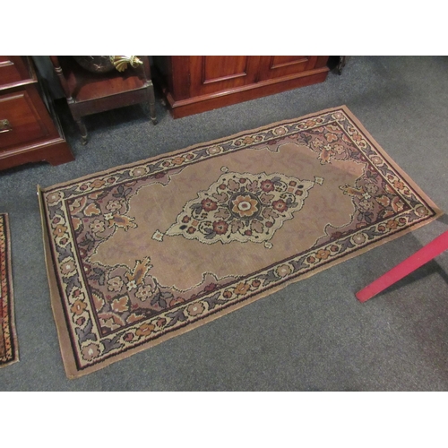 1036 - Five mainly brown ground rugs including floral design runner