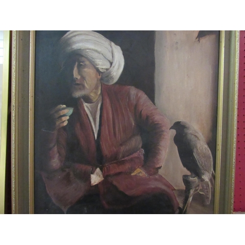 1088 - N.P Hall: An oil on board of a man dressed in traditional Arabic clothing seated by a bird of prey, ... 