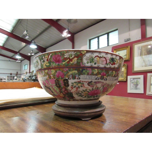 1094 - A 20th Century Chinese Famille Rose pattern table centrepiece bowl with panels of figures and floral... 