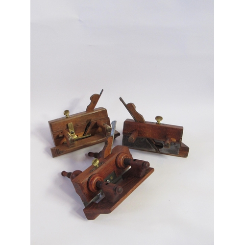 7236 - Three wood and brass plough planes