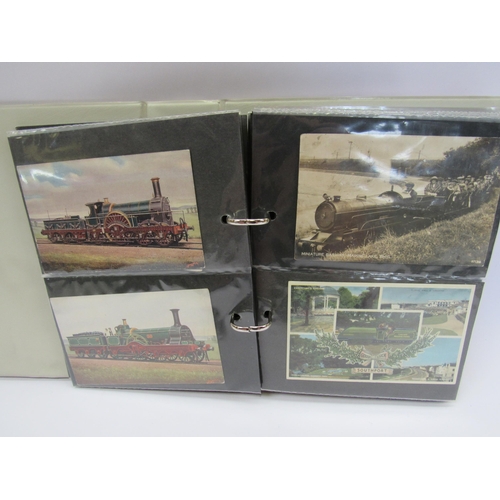 7043 - An album containing approx 100 colour and black and white postcards including locomotives at station... 