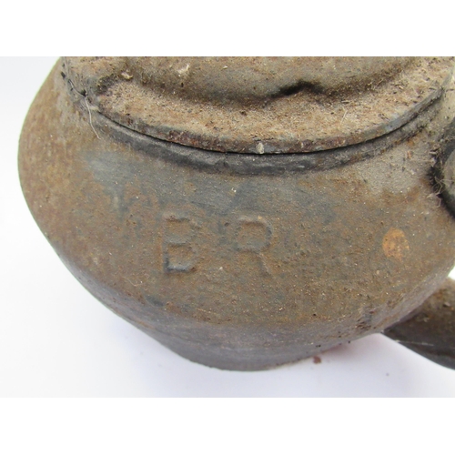 7086 - An iron tea pot stamped B.R to top