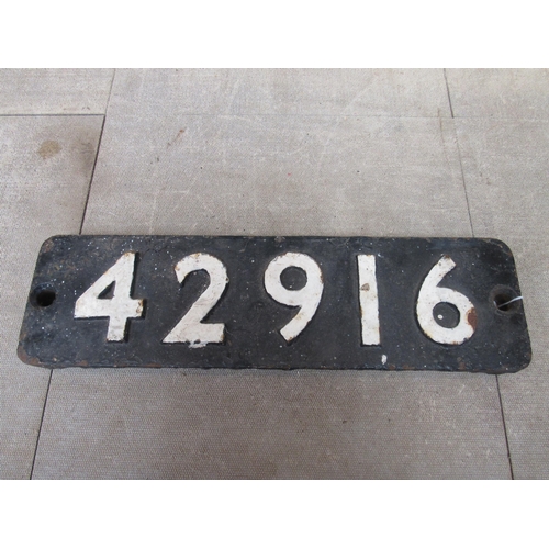 7203 - A cast iron Smokebox numberplate 42916, ex LMS Hughes Crab 2-6-0, built at Crewe in 1930. Shedded at... 