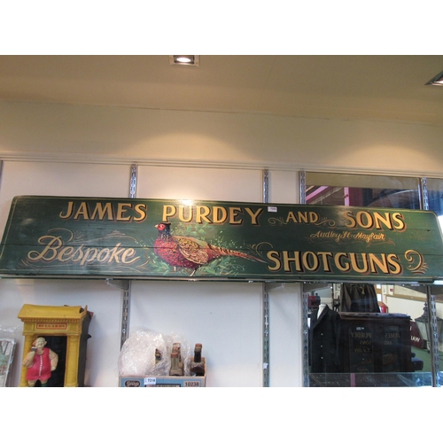 7255 - A wooden board with hand painted advertising for James Purdey Shotguns, 182.5 x 32.5cm