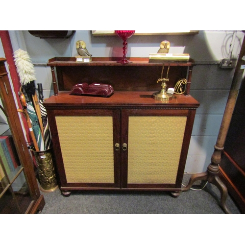 1027 - A 19th Century rosewood chiffonier, the raised gallery back set with single shelf supported by spind... 