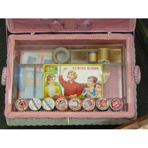 1165 - A vintage plastic woven sewing box together with mixing bowls, book slide and two tins containing mi... 