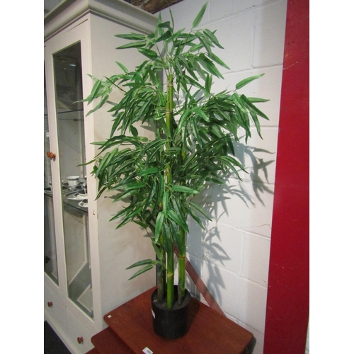 1002 - Two faux bamboo plants