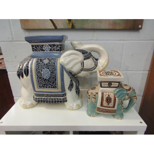 1015 - Two elephant jardiniere stands, 43cm tallest