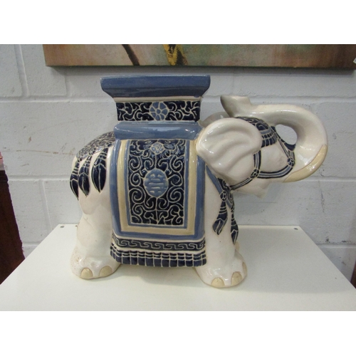 1015 - Two elephant jardiniere stands, 43cm tallest