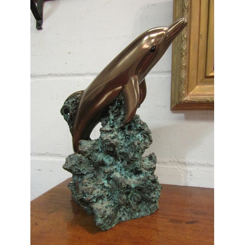 1033 - A Foot's Artworks, Australia 2001 cold cast bronze of a dolphin, 29.5cm high x 24cm wide x 16.5cm de... 