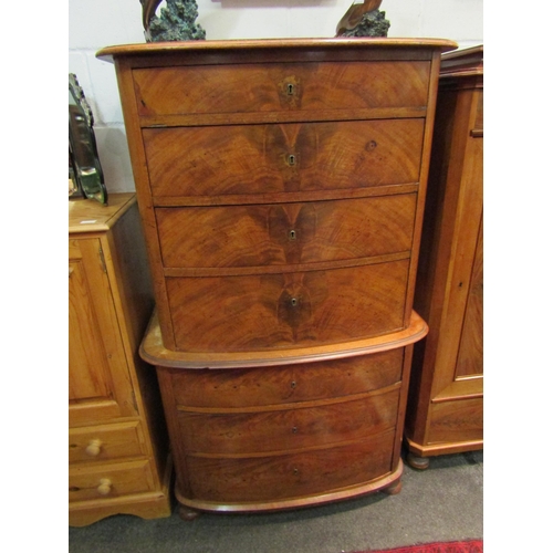 1034 - A 19th Century bow front chest on chest, four graduating drawer top over a three graduating drawer b... 