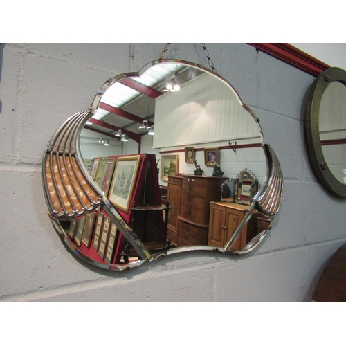 1041 - A Deco wall mirror with pearlescent decoration, 47cm x 66cm