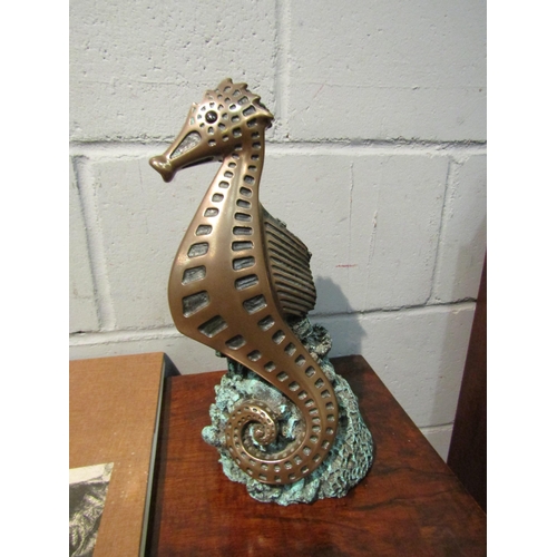 1042 - A Foot's Artworks, Australia 2005 cold cast bronze of a seahorse, 34cm high x 15cm wide x 14cm deep