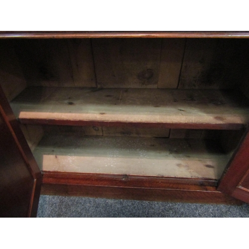 1046 - A Victorian mahogany full height bookcase, glazed top over single drawer and two door cupboard, plin... 