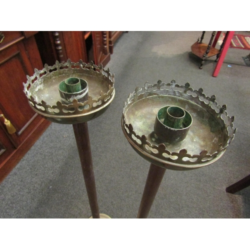 1047 - A pair of tall brass and timber Victorian church candle stands, 93cm high