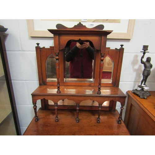 1057 - A Victorian walnut mirror back cabinet with spindle detail and recess over glazed doors, 157cm high ... 