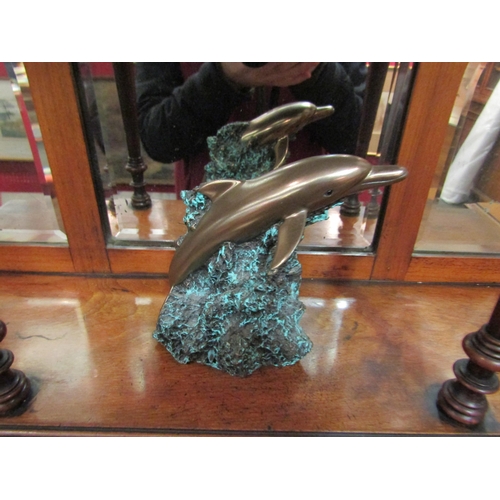 1058 - A Foot's Artworks, Australia 2005 cold cast bronze of a dolphin, No. 98/100, 13cm high x 13.5cm long... 