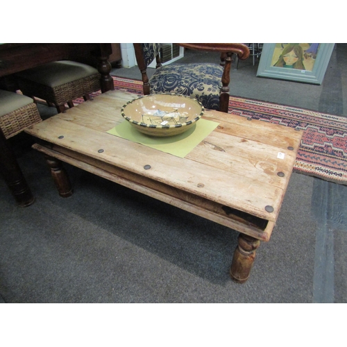 1139 - An Eastern coffee table on turned legs, 42cm high x 110cm long x 60cm wide