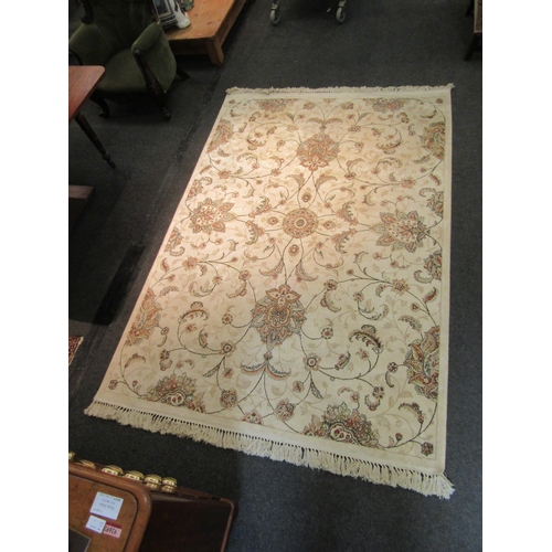 1543 - A cream ground floral pattern silk rug with tasselled ends, 240cm x 161cm   (R)  £80