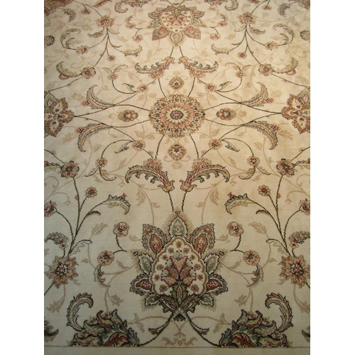 1543 - A cream ground floral pattern silk rug with tasselled ends, 240cm x 161cm   (R)  £80