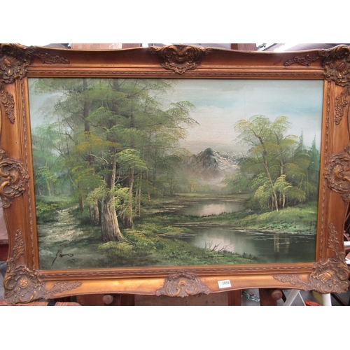 2125 - A gilt framed oil on canvas mountain and riverscape   (R) £30