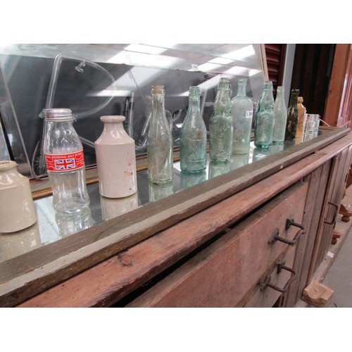 2242 - A quantity of bygone mainly glass and stoneware bottles to include Wheeler & Co, Clegg & Co cod bott... 