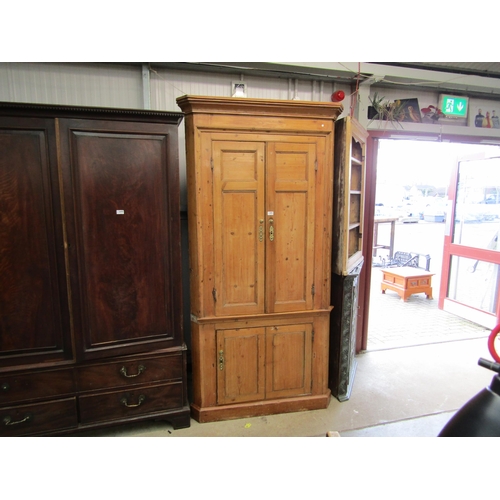 2367 - A Georgian pine three door corner cupboard with shaped shelved interior   (R)  £200