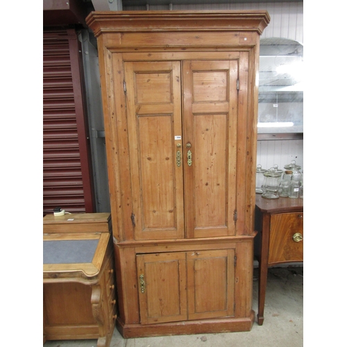 2367 - A Georgian pine three door corner cupboard with shaped shelved interior   (R)  £200