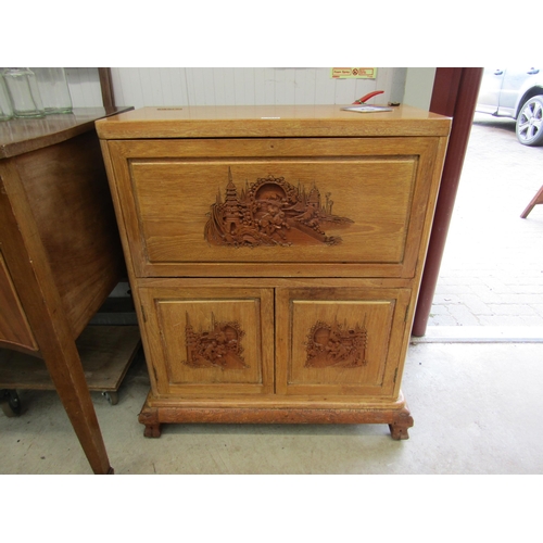 2249 - A Chinese carved hardwood drinks cabinet    (R) £30