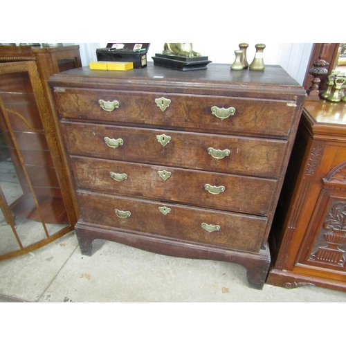 2119 - An early Georgian figured walnut graduating chest of four drawers on bracket base, formally a bottom... 