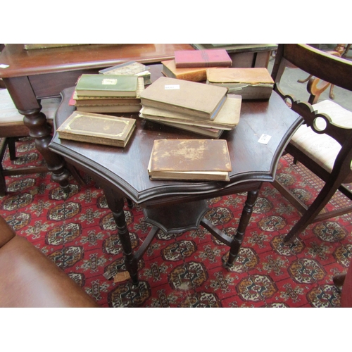 2233 - An Edwardian walnut shaped top occasional table